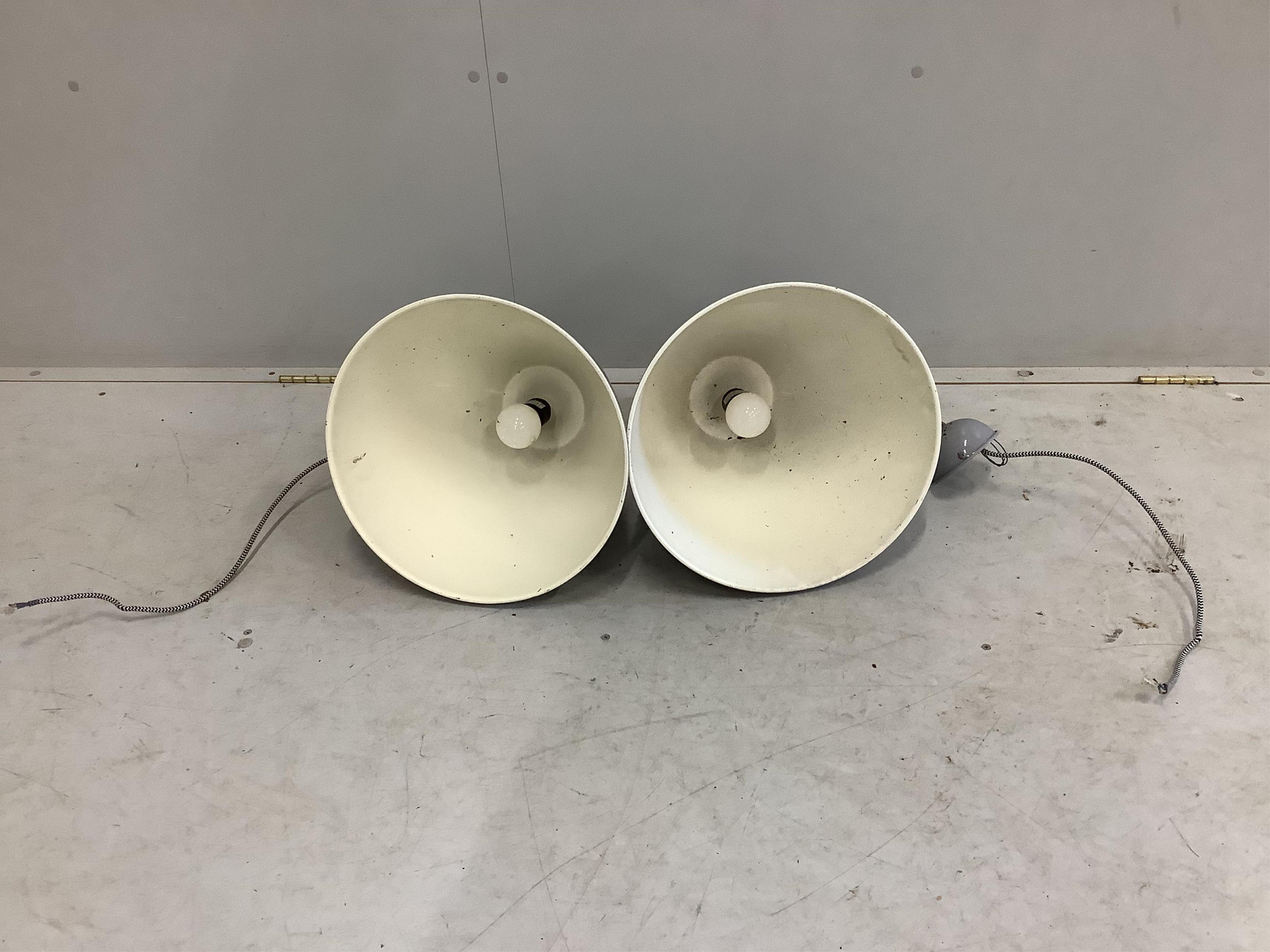 A pair of industrial style ceiling lamps by Barker and Stonehouse, diameter 37cm, height 48cm. Condition - fair to good